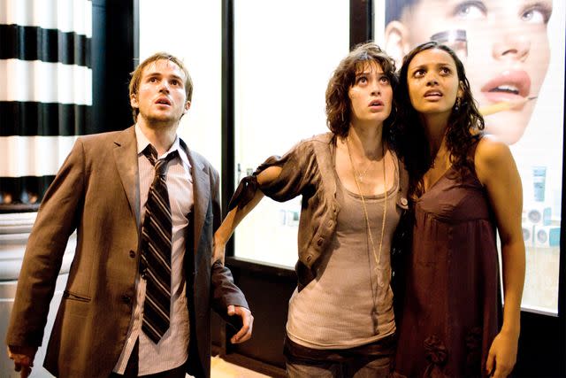 <p>Paramount/courtesy Everett</p> Michael Stahl-David, Lizzy Caplan, and Jessica Lucas in 'Cloverfield'
