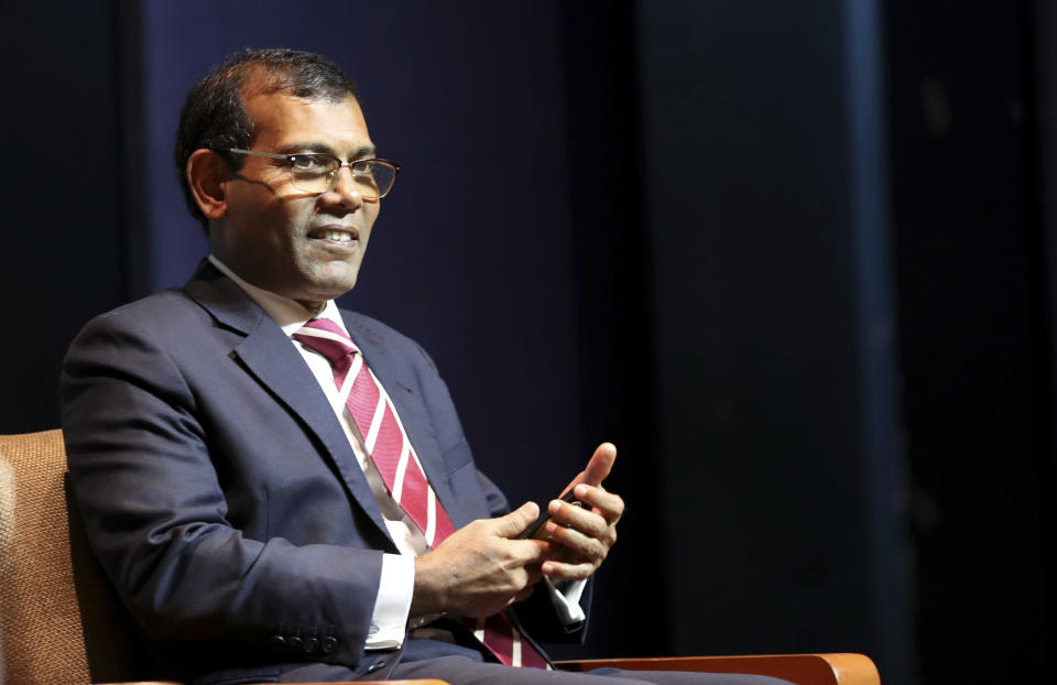 Former Maldives President Mohamed Nasheed takes a seat before delivering a lecture on climate change in New Delhi, India, Thursday, Feb. 14, 2019. In an interview to The Associated Press Thursday after giving a climate change lecture, Nasheed said the Indian Ocean archipelago nation is seeking tenders for renewable energy projects to help lessen the burden of foreign debt. (AP Photo/Manish Swarup)