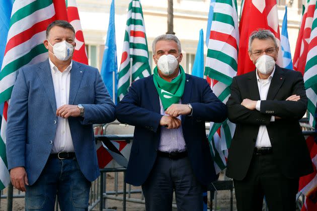 The 3 secretaries of the most important Italian trade unions, Pierpaolo Bombardieri (UIL), Luigi Sbarra (CISL) and Maurizio Landini (CGIL) pose for photographers during the demonstration of the trade unions in Piazza Montecitorio. Rome (Italy), May 28th 2021