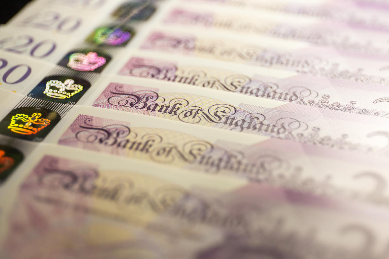 UNITED KINGDOM - 2020/06/06: In this photo illustration banknotes of the pound sterling, The Bank of England £20 notes are seen displayed. (Photo Illustration by Karol Serewis/SOPA Images/LightRocket via Getty Images)