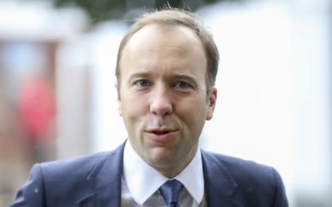 The Health Secretary, Matt Hancock has said vaccines could be made mandatory to combat falling rates  - Credit: Bloomberg