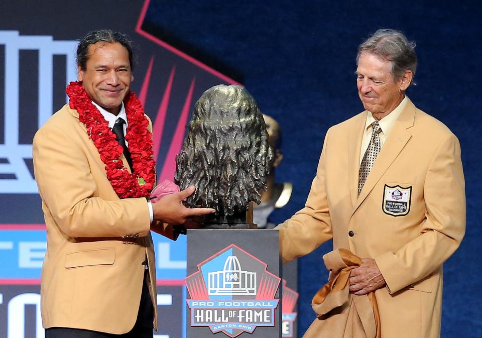 Troy Polmalu  shows off his signature hair in his enshrinement bust.Troy Polmalu was enshrined in the Pro Football Hall of Fame at Tom Benson Hall of Fame Stadium on Saturday, August 7, 2021. Polmalu was presented by Steelers defensive coordinator Dick LeBeau. 