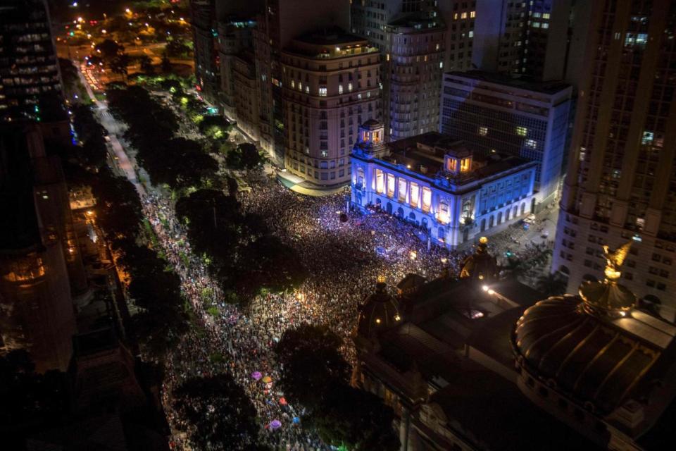 Thousands of protestors gathered outside the city council chamber (AFP)