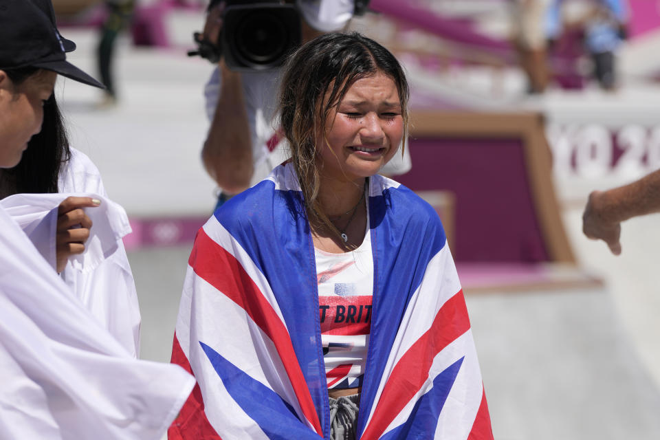 Sky Brown of Britain reacts after winning the bronze in the women's park skateboarding finals at the 2020 Summer Olympics, Wednesday, Aug. 4, 2021, in Tokyo, Japan. (AP Photo/Ben Curtis)