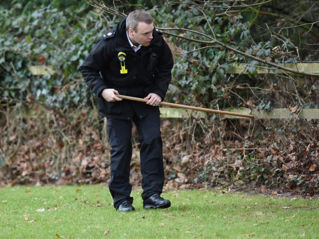 Security checks in the grounds ahead of the service