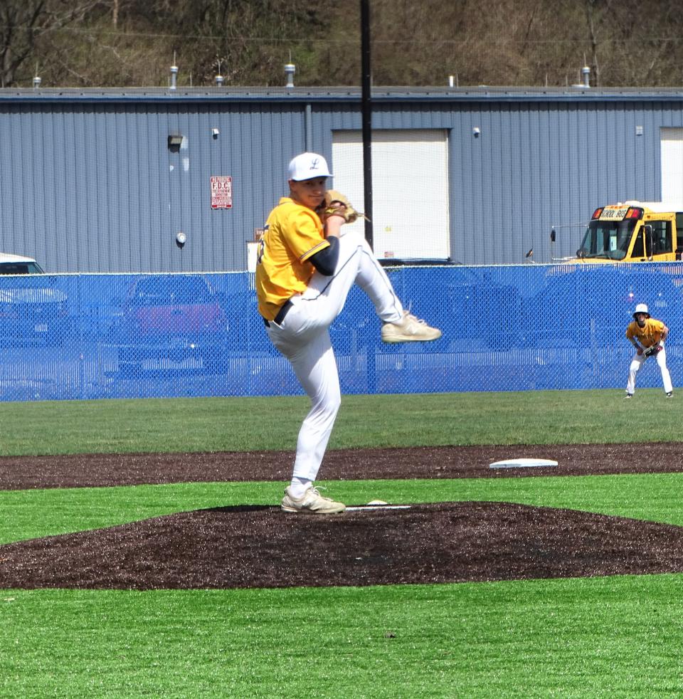 Lancaster senior pitcher Isaac Cooperrider prepares to deliver a pitch during the first inning against visiting Licking Heights. The Golden Gales scored late to pull out a 2-1 win.