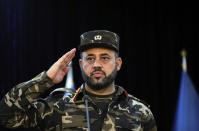 Gen. Ajmal Omar Shinwari, spokesperson for the Afghan armed forces salutes towards journalists during a press conference in Kabul, Afghanistan, Sunday, Aug. 1, 2021. Shinwari said Sunday in a press conference that three provinces located in south and western parts of Afghanistan are under critical security situation. ​(AP Photo/Rahmat Gul)