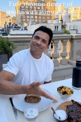 <p>Kelly Ripa/Instagram</p> Mark Consuelos enjoys a rooftop dinner with wife Kelly Ripa