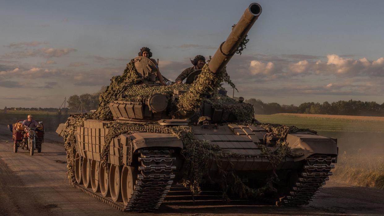 Ukrainian servicemen operate a Soviet-made T-72 tank in the Sumy region on August 12, amid an ongoing offensive into nearby Russian territory.