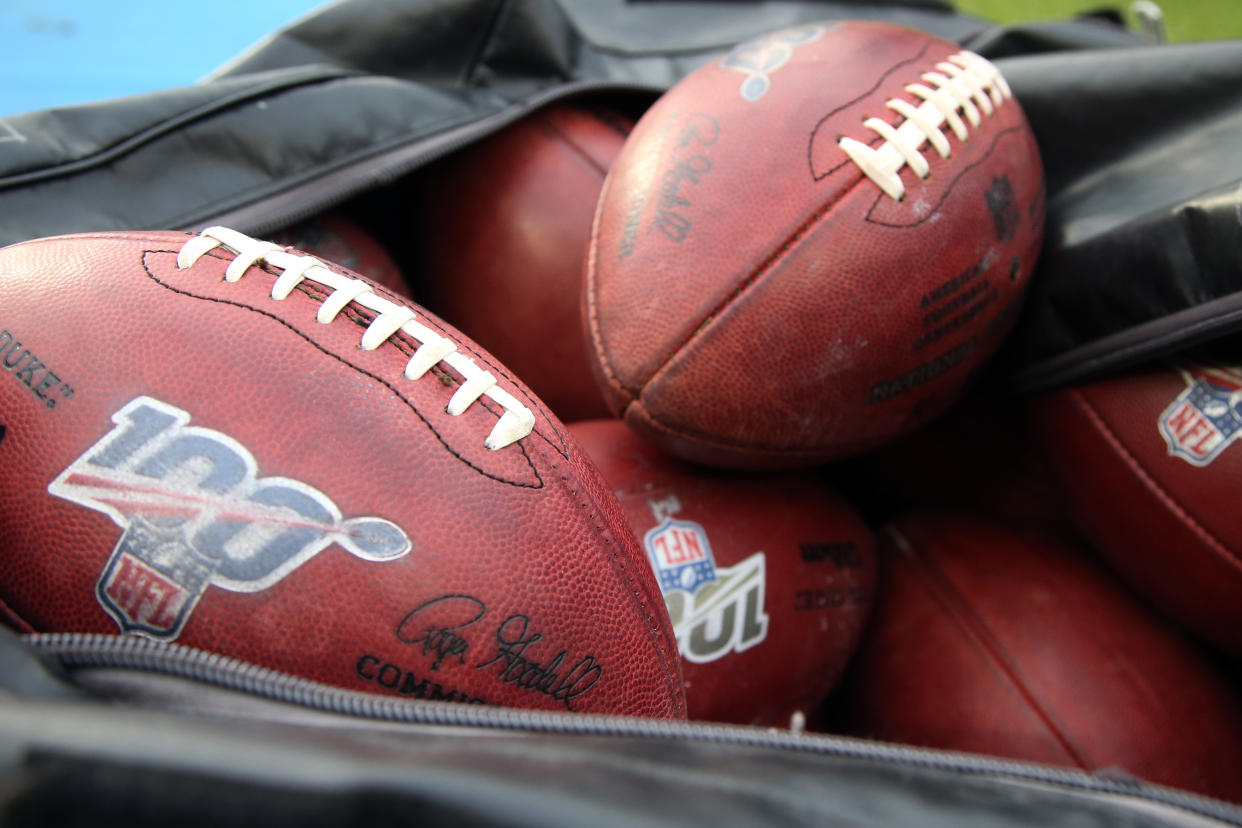 LOS ANGELES, CA - DECEMBER 22: Official Footballs with NFL 100th Anniversary logo during an NFL game between the Oakland Raiders and the Los Angeles Chargers on December 22, 2019, at Dignity Health Sports Park in Los Angeles, CA. (Photo by Kiyoshi Mio/Icon Sportswire via Getty Images)