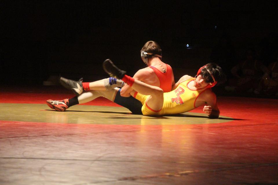 Rocky Ford's Mateo Martinez grapples with Buena Vista's Caleb Camp in their 113 pound bout last Wednesday in Rocky Ford.