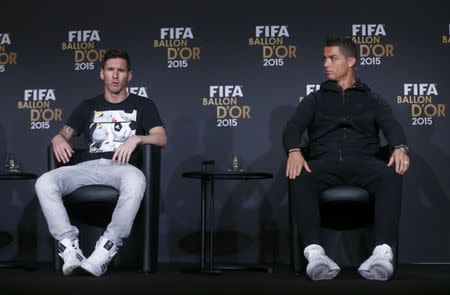 Nominees for the 2015 FIFA World Player of the Year FC Barcelona's Lionel Messi of Argentina and Real Madrid's Cristiano Ronaldo of Portugal (R) attend a news conference prior to the Ballon d'Or 2015 awards ceremony in Zurich, Switzerland, January 11, 2016 REUTERS/Arnd Wiegmann