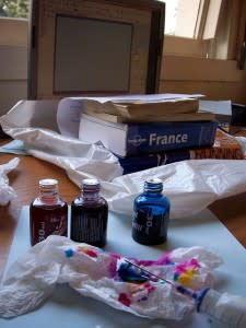 Printer ink next to France travel guide