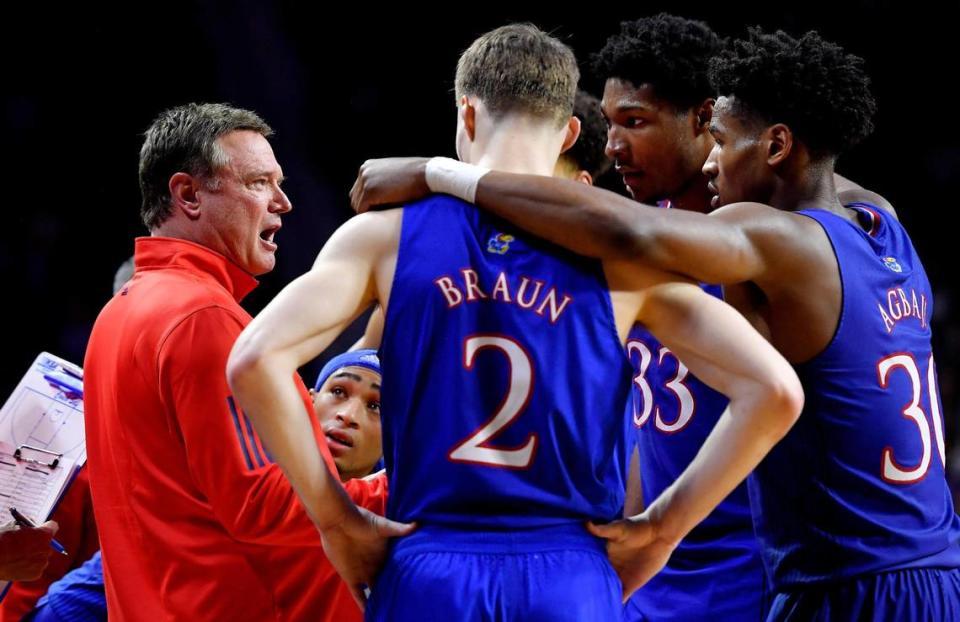 Kansas coach Bill Self settles his crew with under a minute left on the clock during the second half of Saturday’s Big 12 Conference game at Bramlage Coliseum. KU came back after trailing the entire game to beat Kansas State, 78-75.