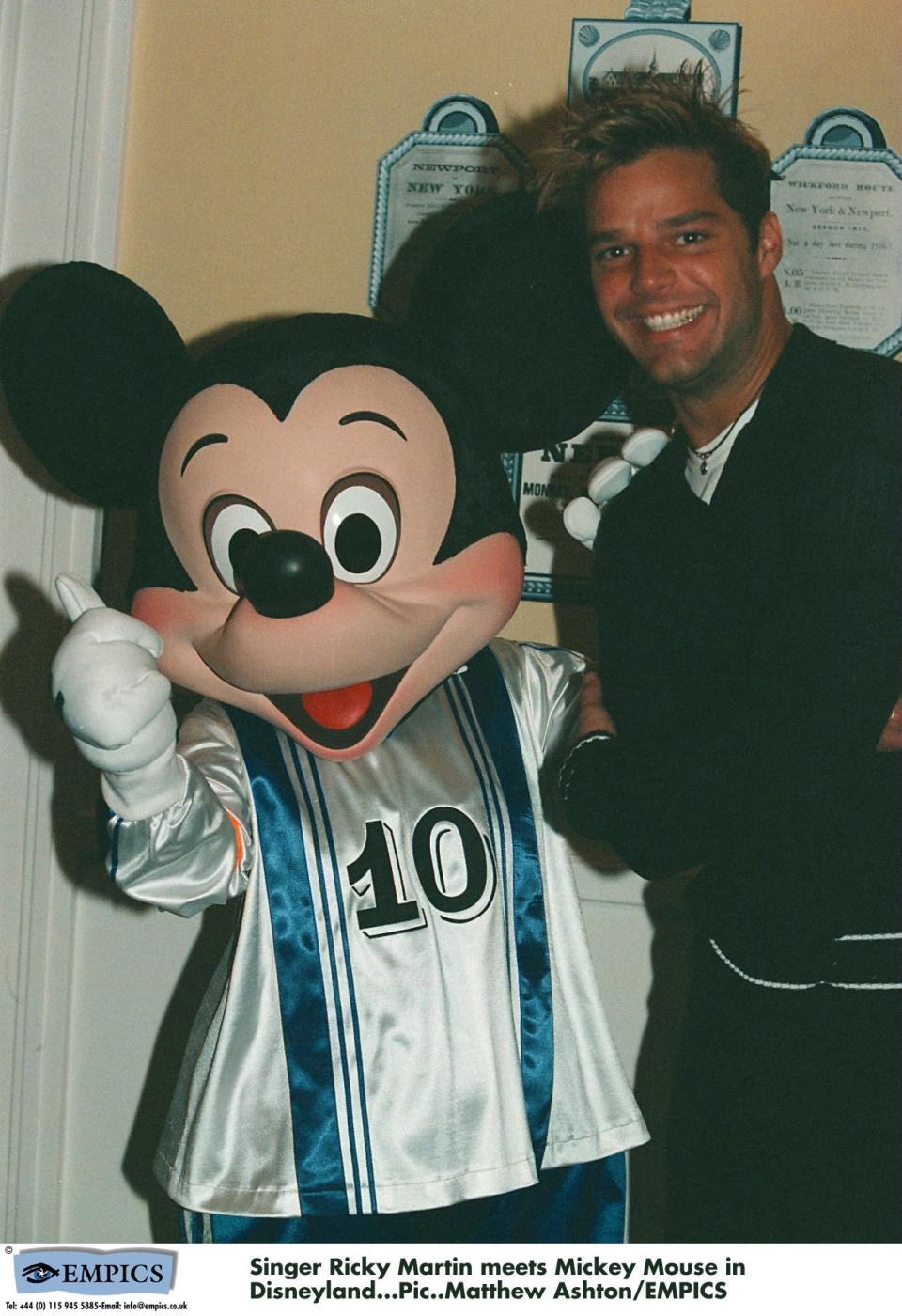 Singer Ricky Martin meets Mickey Mouse in Disneyland