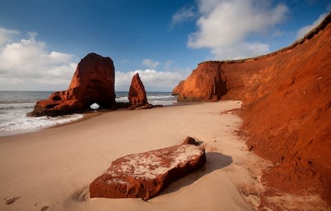 The Red Sandstone Cliffs - Credit: Getty