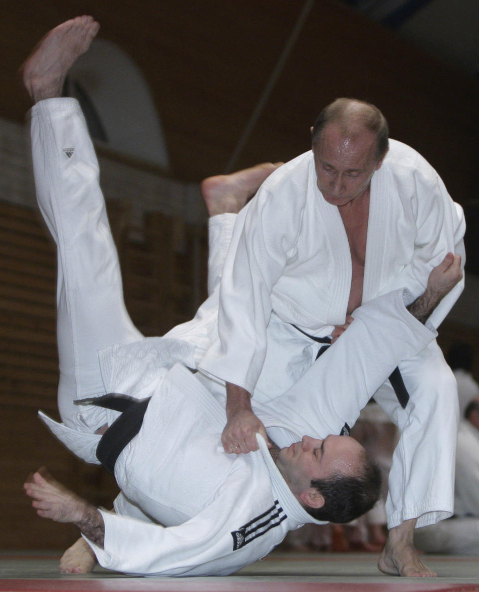 Putin shows off his judo skills in St. Petersburg, Russia, on Dec. 18, 2009.