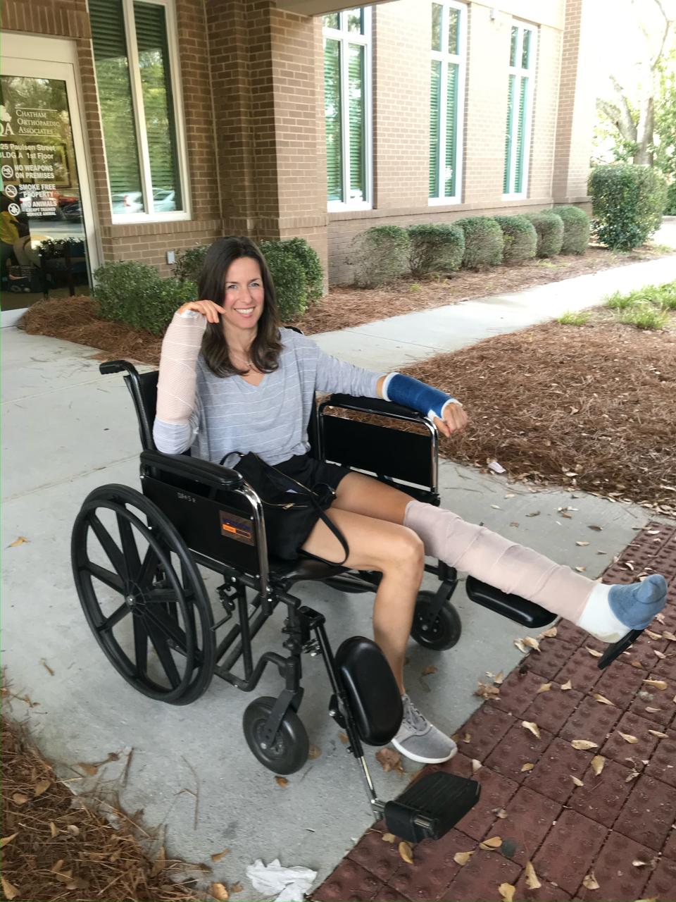 Dionne Mcaffee outside of Chatham Orthopedic after a motorcycle crash that shattered her left leg and broke both wrists.