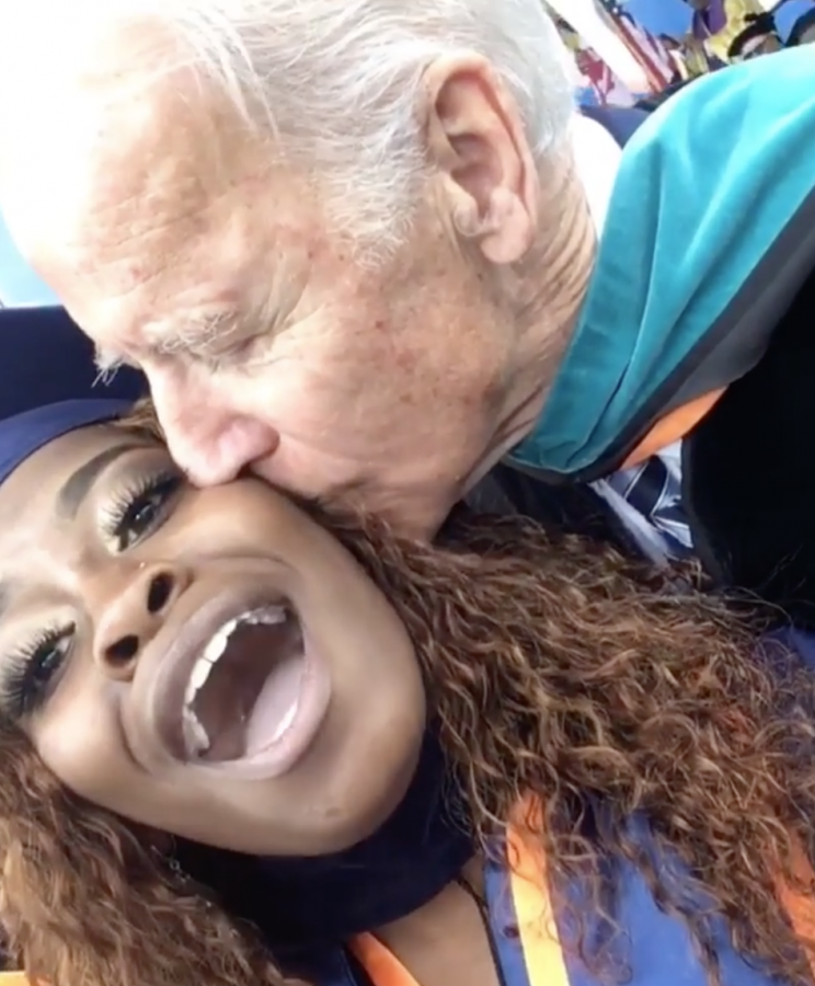 Former Vice President Joe Biden gives Brieana Carter a kiss on the cheek during her graduation from Morgan State University on May 20.