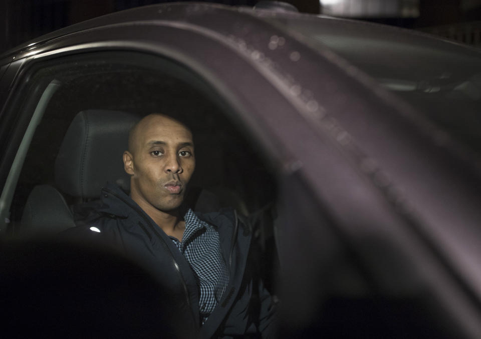 FILE - In this March 21, 2018 file photo, former Minneapolis Police Officer Mohamed Noor sits in the pickup truck of his attorney after posting bond and leaving the Hennepin County Public Safety Facility in Minneapolis. Noor, a black Somali-American, is the only officer known to have been charged for murder in an on-duty killing, and his victim was white. (Jeff Wheeler/Star Tribune via AP)
