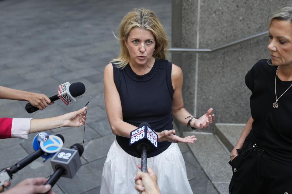 Sexual assault survivors Laurie Kanyok, second from right, and Amy Yoney, right, speak to members of the media during a break in sentencing proceedings for convicted sex offender Robert Hadden outside Federal Court, Monday, July 24, 2023, in New York. The former obstetrician was convicted of sexually abusing multiple patients over several decades. (AP Photo/John Minchillo)