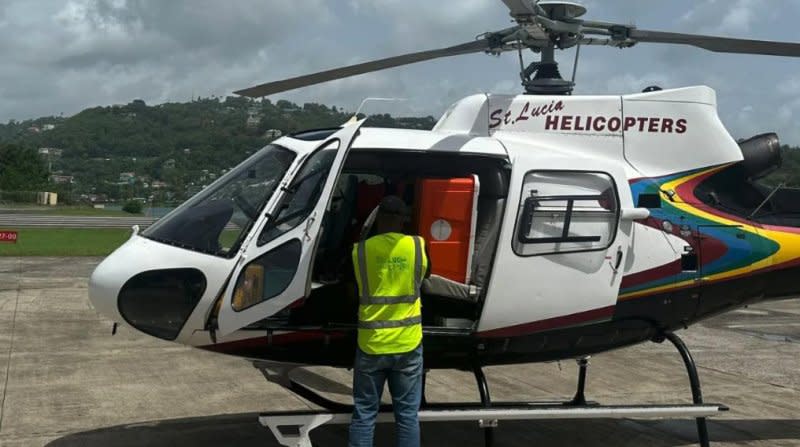 Members of the Office of Eastern Caribbean States (OECS) load Direct Relief Emergency Medical Backpacks and a Hurricane Preparedness Pack into a helicopter in St. Lucia, in preparation for transport to St. Vincent and the Grenadines as Hurricane Beryl approached. On Tuesday, the hurricane had killed at least six people. Photo courtesy of OECS