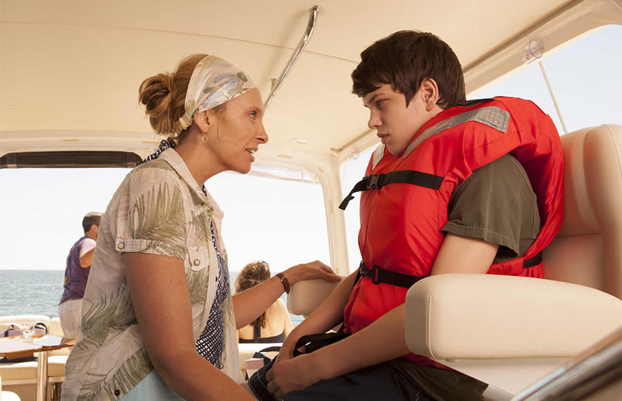 Toni Collette and her son in a life jacket