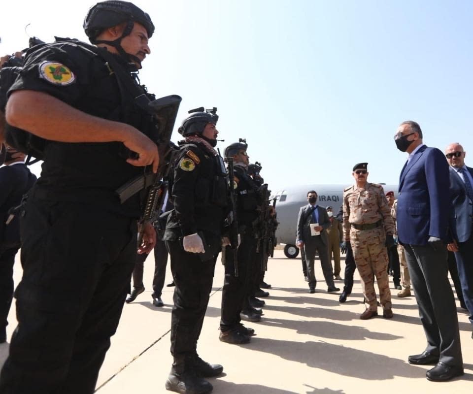 TAKES OUT REFERENCE TO DESIGNATE -Iraqi Prime Minister Mustafa al-Kahdimi, right, arrives to Mosul, Iraq, Wednesday, June 10, 2020. (Iraqi Prime Minister Media Office, via AP)