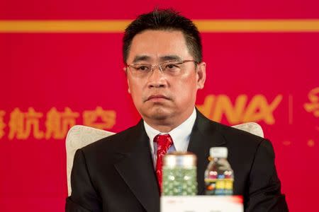Wang Jian, Co-Chairman of HNA Group attends a meeting marking the 20th anniversary of company's founding in Haikou, Hainan province, China, April 28, 2013. REUTERS/Stringer