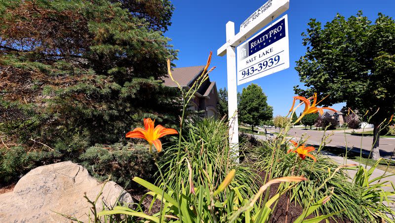 A home for sale sign is pictured in the Salt Lake Valley on July 16, 2021.