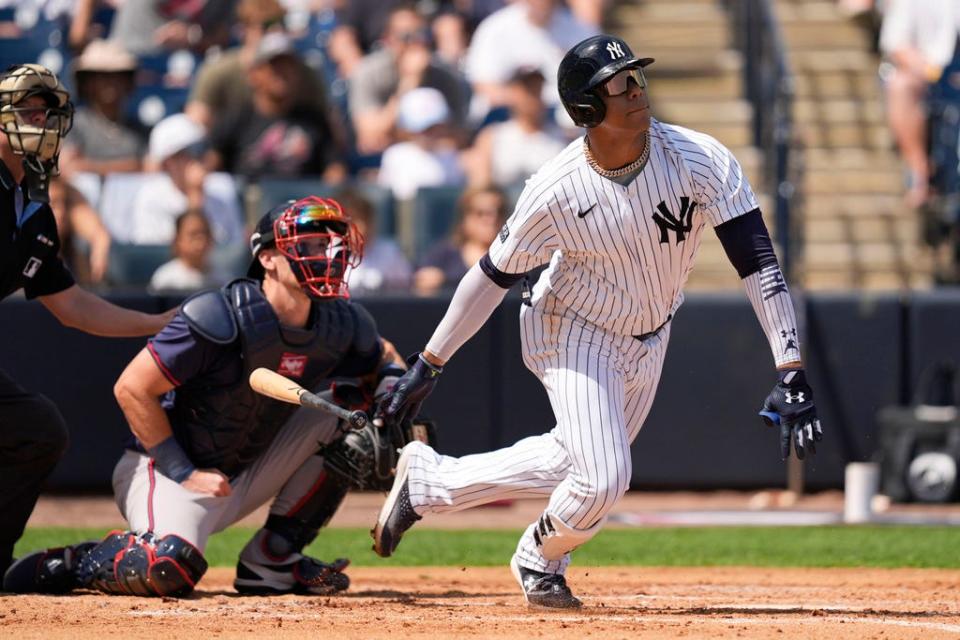New York Yankees' Juan Soto grounds out in the second inning of a spring training baseball game against the Atlanta Braves Sunday, March 10, 2024, in Tampa, Fla. (AP Photo/Charlie Neibergall)