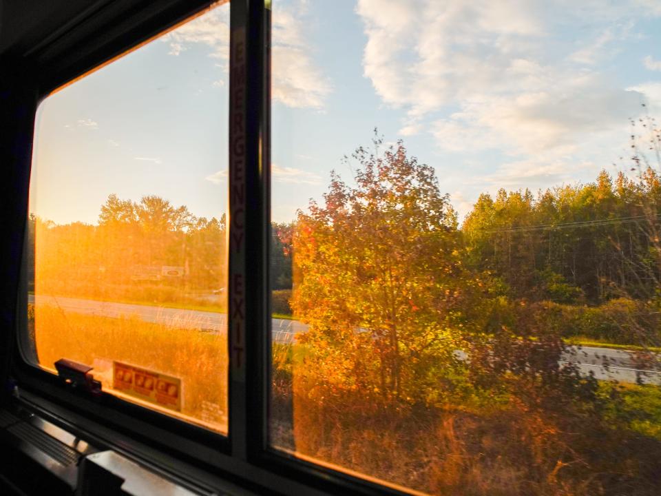 A view of the sunset out the window in an Amtrak roomette