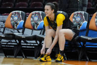 Iowa's Caitlin Clark ties her shoe during a practice for an NCAA Women's Final Four semifinals basketball game Thursday, April 4, 2024, in Cleveland. (AP Photo/Carolyn Kaster)