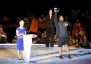 Gold Coast 2018 Commonwealth Games - Closing ceremony - Carrara Stadium - Gold Coast, Australia - April 15, 2018 - President of the Commonwealth Federation Louise Martin awards the athlete of the games, David Liti of New Zealand. REUTERS/David Gray