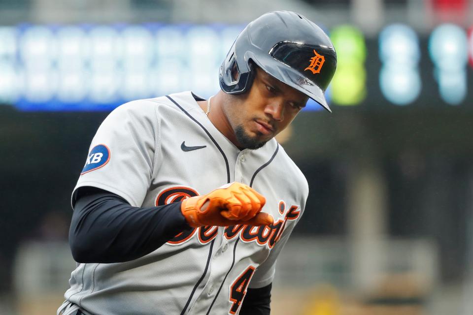 Detroit Tigers third baseman Jeimer Candelario runs the bases and pounds his chest after his two-run home run against the Minnesota Twins in the 10th inning at Target Field in Minneapolis, May 25, 2022.