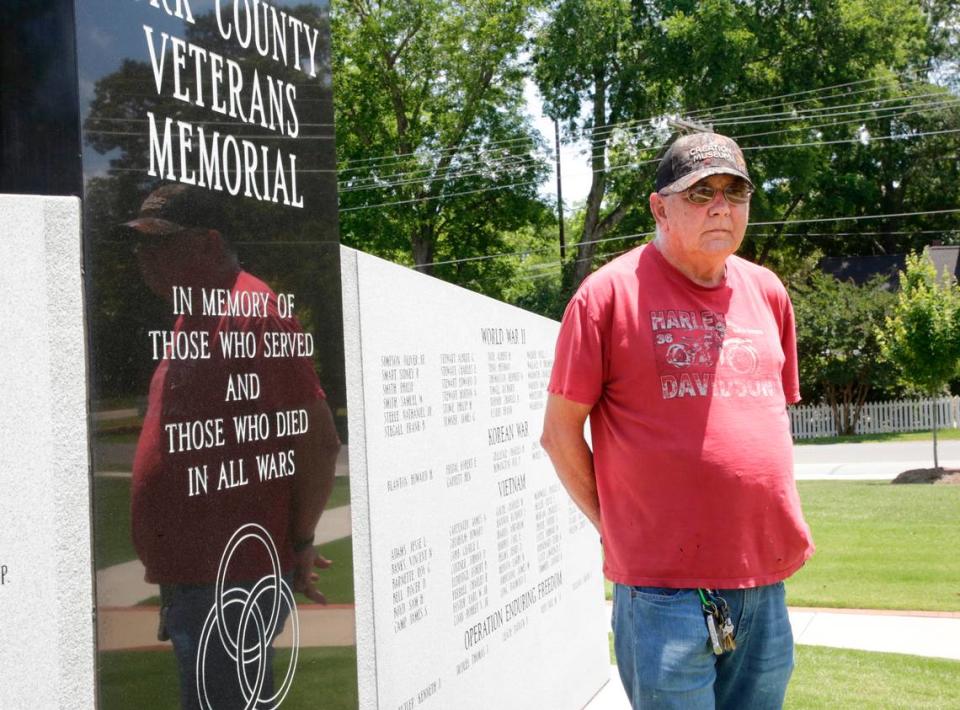 Ronnie Taylor stands in front of the York County Veterans Memorial Wednesday in York.