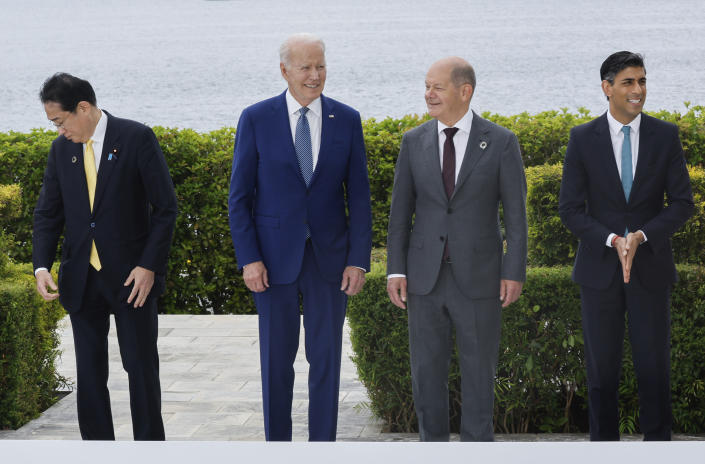 From left to right, Japan's Prime Minister Fumio Kishida, U.S. President Joe Biden, Germany's Chancellor Olaf Scholz and Britain's Prime Minister Rishi Sunak participate in a family photo with G7 leaders before their working lunch meeting on economic security during the G7 summit, at the Grand Prince Hotel in Hiroshima, western Japan Saturday, May 20, 2023. (Jonathan Ernst/Pool Photo via AP)