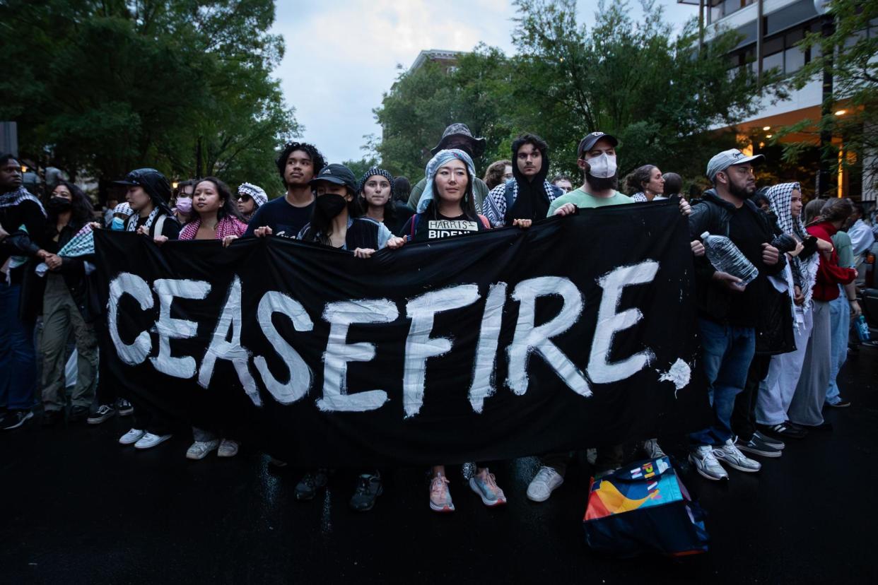 <span>Pro-Palestinian students rally outside the office of George Washington University president in Washington DC on Thursday.</span><span>Photograph: Allison Bailey/NurPhoto/Rex/Shutterstock</span>