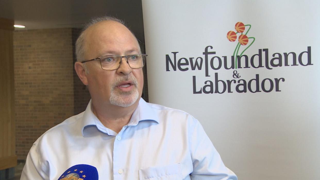 Newfoundland and Labrador Housing Minister Fred Hutton took questions from reporters at Confederation Building in St. John's on Thursday morning about new standards for emergency shelters in the province. (Darryl Murphy/CBC - image credit)