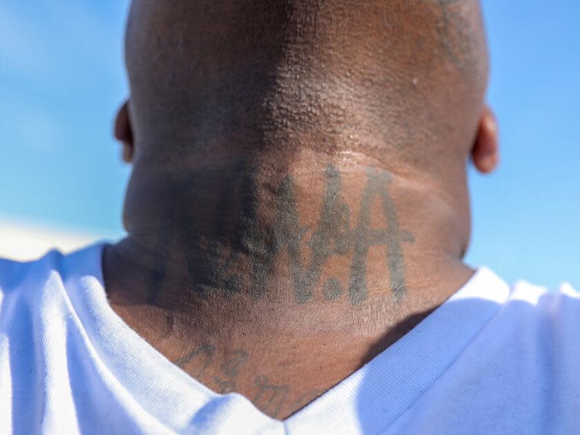 An attendee at Wednesday's ceremony shows his N.W.A tattoo.