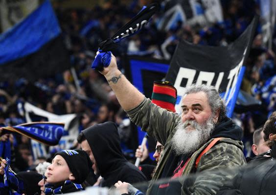 An Atalanta fan watching on at the San Siro (Getty Images)