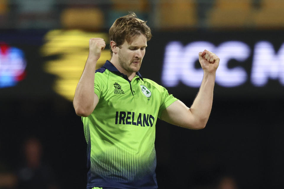 Ireland's Barry McCarthy celebrates after taking the wicket of Australia's Aaron Finch during the T20 World Cup cricket match between Australia and Ireland, in Brisbane Australia, Monday, Oct. 31, 2022. (AP Photo/Tertius Pickard)