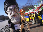 <p>A demonstrator dressed as the Iranian Supreme Leader Ayatollah Ali Khamenei participates a rally across from the White House in Washington, on Saturday, Jan. 6, 2018, in solidarity with anti-government demonstrators in Iran. (Photo: Pablo Martinez Monsivais/AP) </p>