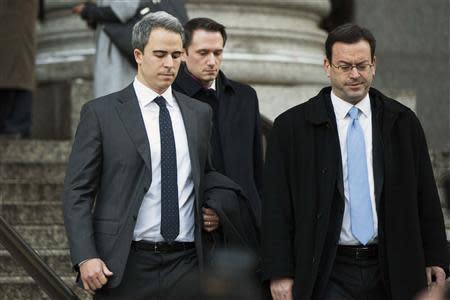 Michael Steinberg (L), a top portfolio manager at Steven A. Cohen's SAC Capital Advisors hedge fund, departs Federal Court in Manhattan after being found guilty on charges that he traded on insider information in New York December 18, 2013. REUTERS/Lucas Jackson