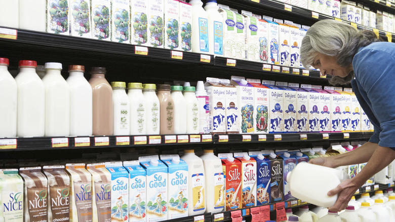 Person shopping for dairy products