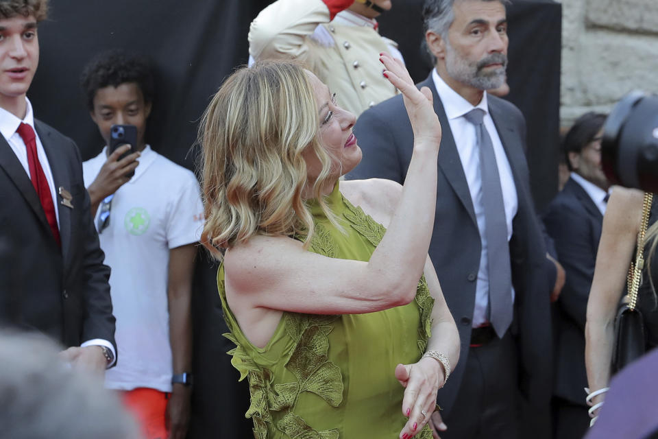 Italian Prime Minister Giorgia Meloni gestures as she attends a gala concert at the Verona Arena to celebrate the recognition by UNESCO of the Italian art of opera singing, in Verona, Italy, Friday, June 7, 2024. (Paola Garbuio/LaPresse via AP)