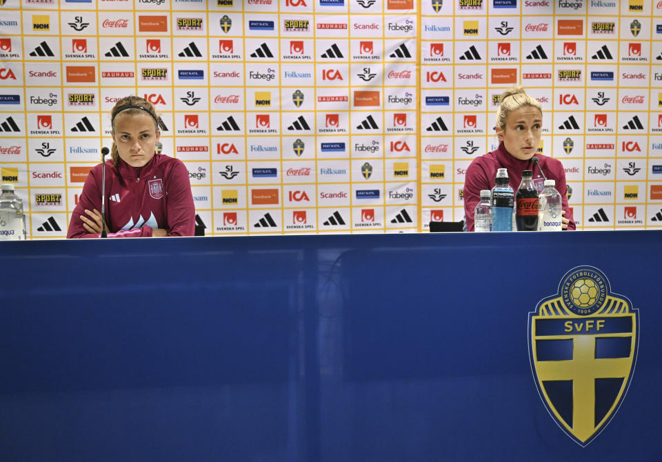 Spain's women's national soccer team players Irene Paredes, left, and Alexia Putellas attend a press conference in Gothenburg, Sweden, ahead of the UEFA Nations League soccer match against Sweden, Thursday, Sept. 21, 2023. (Bjorn Larsson Rosvall/TT News Agency via AP)