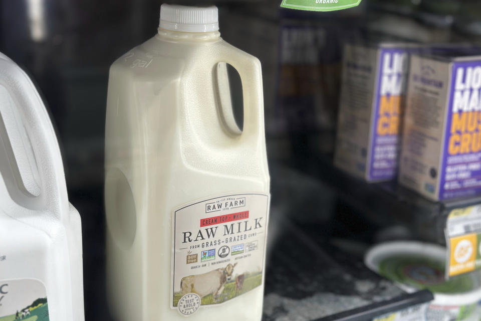 A bottle of raw milk is displayed for sale at a store in Temecula, Calif., on Wednesday, May 8, 2024. Sales of raw milk appear to be on the rise, despite an outbreak of bird flu in U.S. dairy cows. Federal officials warn about the health risks of drinking raw milk at any time, but especially during this novel outbreak. (AP Photo/JoNel Aleccia)