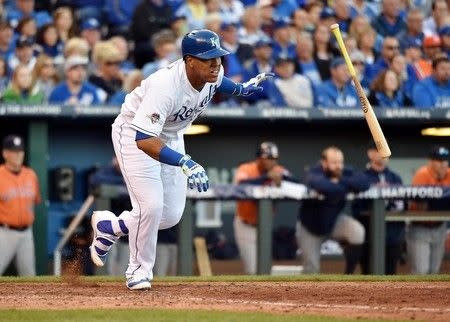 Oct 9, 2015; Kansas City, MO, USA; Kansas City Royals catcher Salvador Perez hits a single against the Houston Astros in the 8th inning in game two of the ALDS at Kauffman Stadium. Mandatory Credit: Peter G. Aiken-USA TODAY Sports