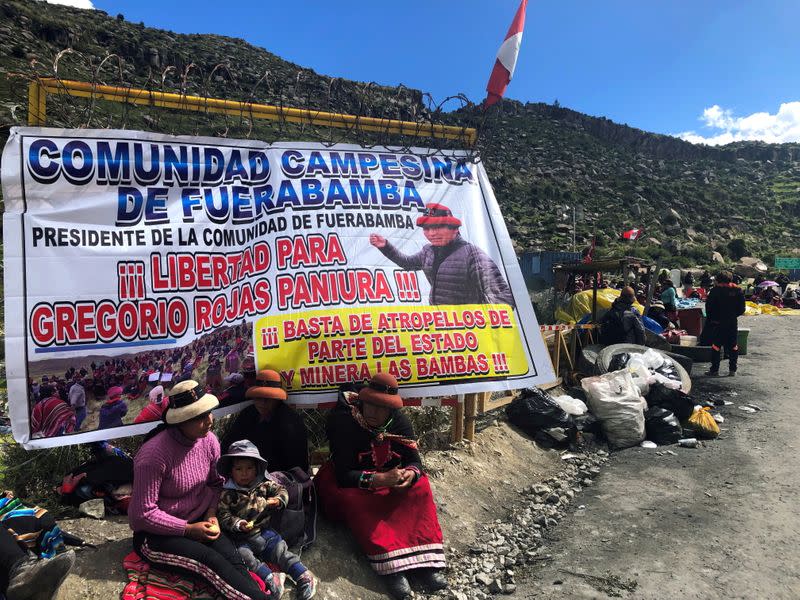 FILE PHOTO: Demonstrators block a road access to a copper mine during a protest in Fuerabamba